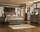 Juararo Queen Panel Bed with Mirrored Dresser and 2 Nightstands