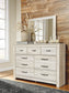 Bellaby  Crossbuck Panel Bed With Mirrored Dresser And Chest